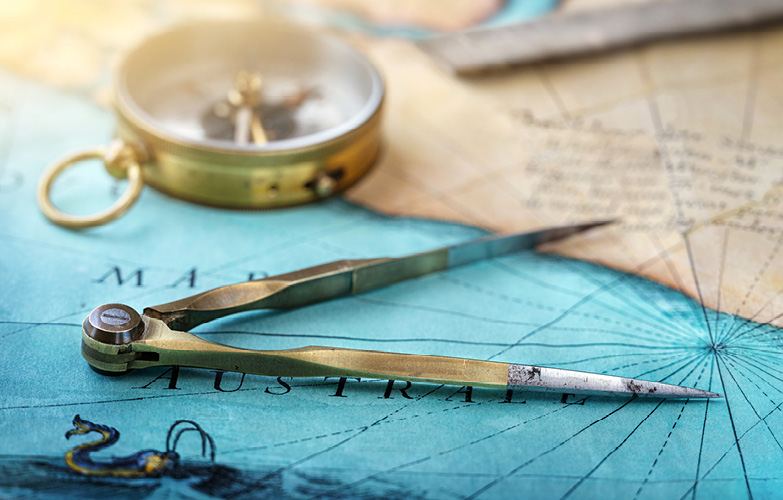 compass over a nautucal map