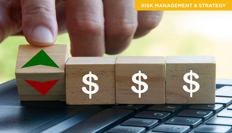 dollar signs on wooden blocks showing currency fluctuation