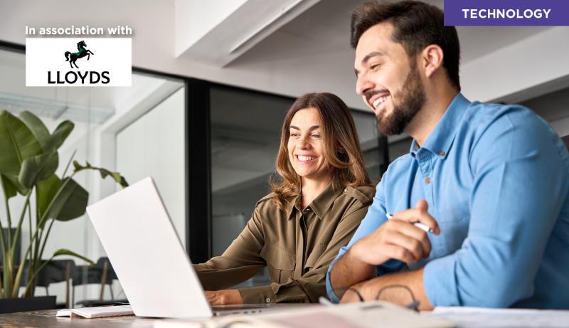 man and woman on computer