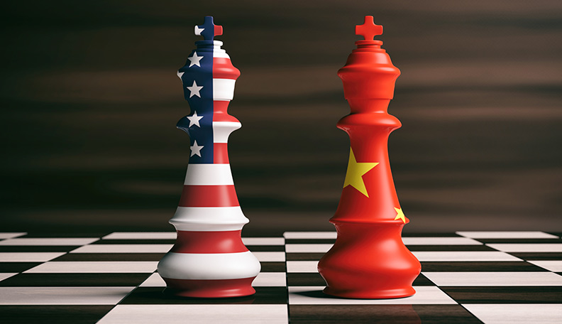 Illustration of two kings on a chessboard, one painted with the American flag, the other with the Chinese flag