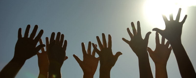 image showing hands raised