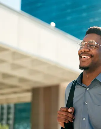 Man smiling. Representing the treasury eLearning First Steps in Treasury series