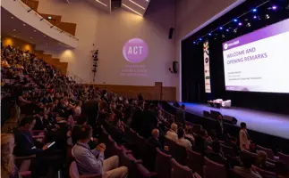 Association of Corporate Treasurers members and delegates listening to a seminar in the main auditorium at the annual conference