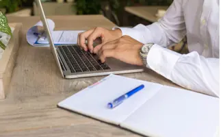 A student working on their laptop