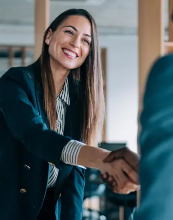 Professionals handshaking, concept showing partner accreditation